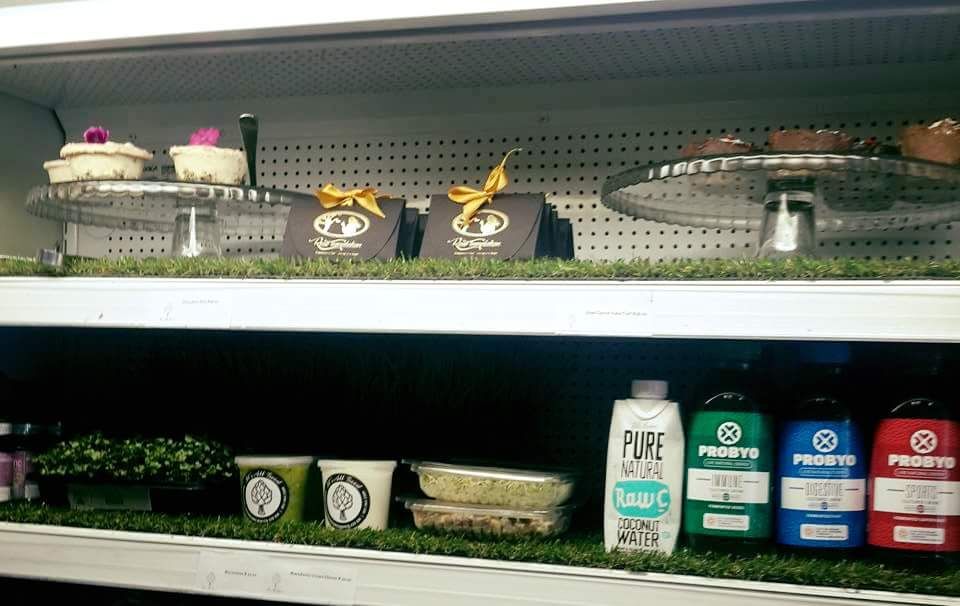 Raw Temptation gift boxes on a refrigerated shop shelf